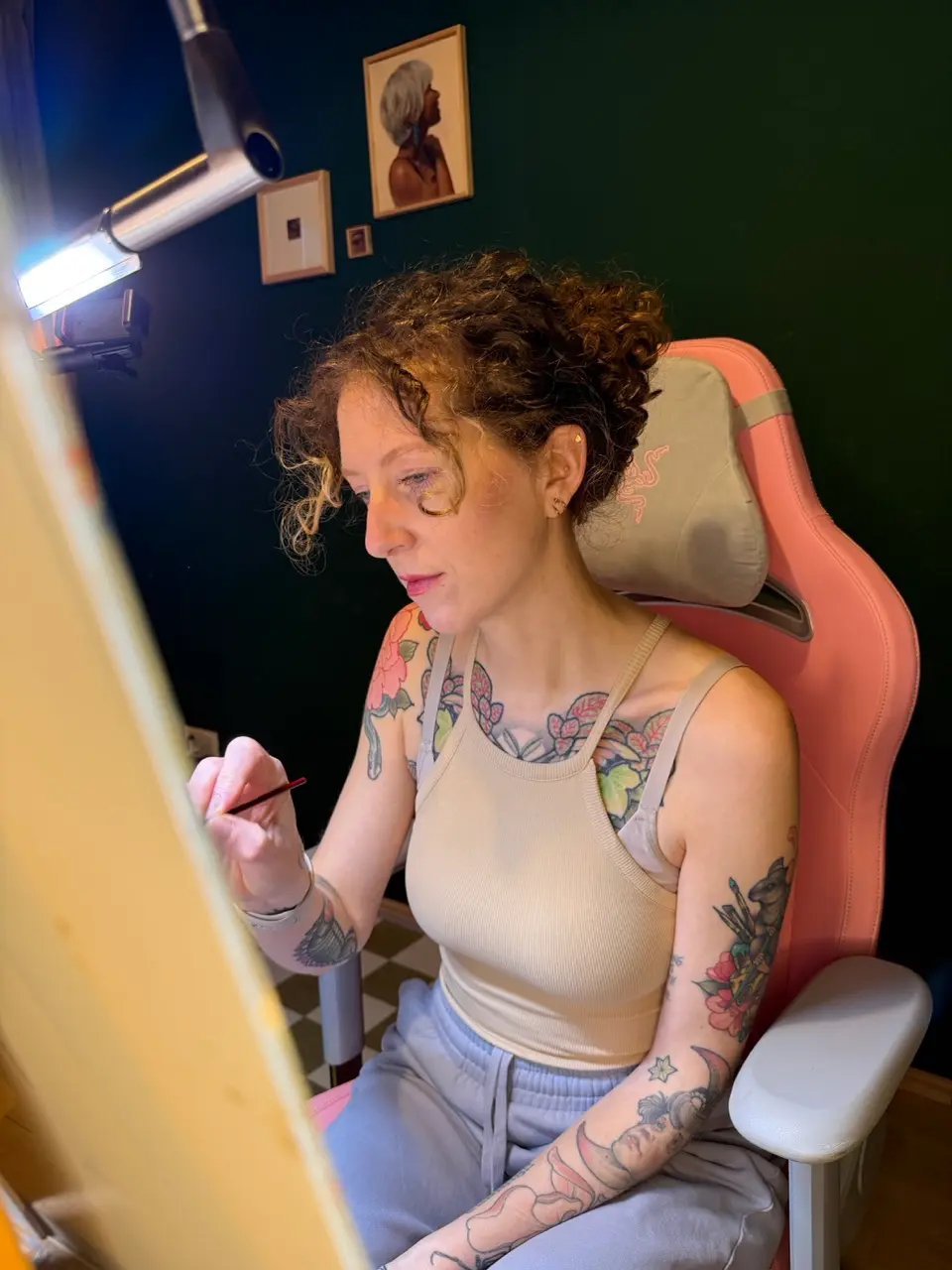 A portrait of Franziska Haaf, also known as Franni Card Art. She has shoulder-length brown hair and is smiling warmly at the camera. She is wearing a light-colored top and is positioned against a neutral background.